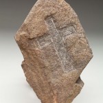 Cross carved in stone BeGx-1